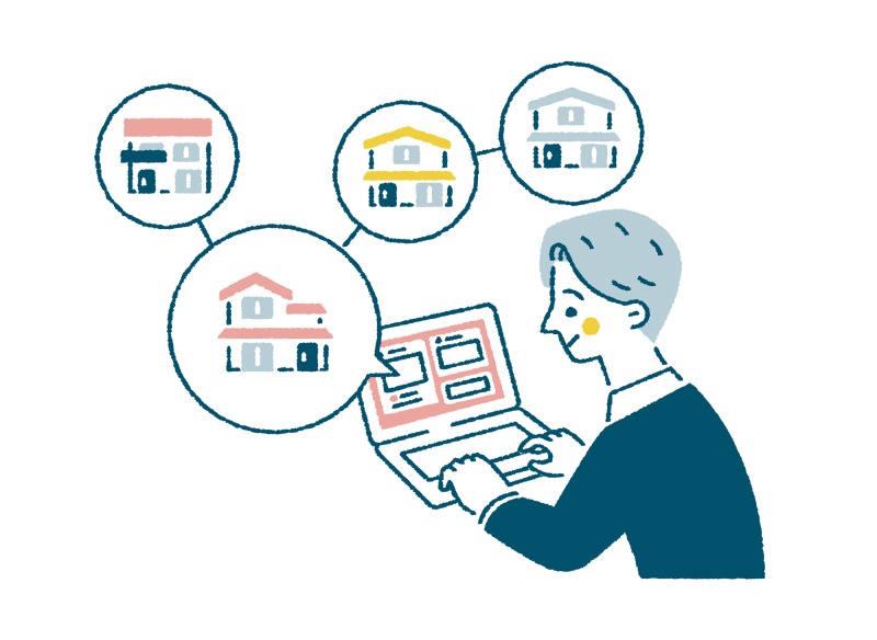 パソコンでマイホームの情報収集をする男性